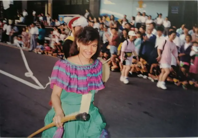 Mayte Montero playing the gaita in a parade in Korea.